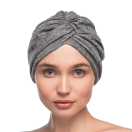 Ruched turban with a crossed front in grey with a subtle gold pattern GALAXY
